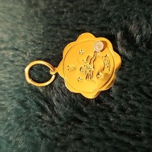 2 Gold Toned Pendants